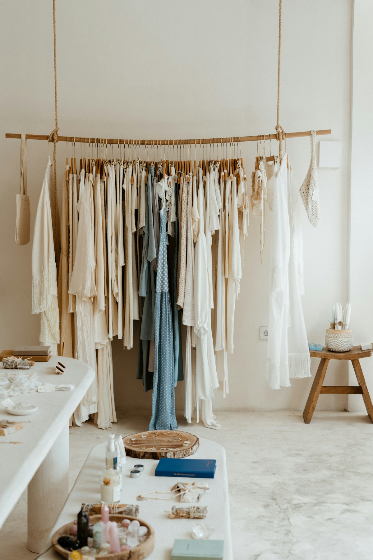 Seasonal fashion garments arranged on a clothing rail